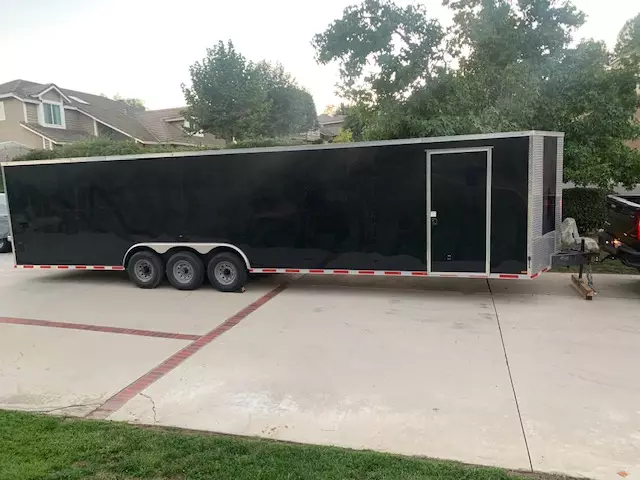 34ft Enclosed Trailer with 4 Rows of D-Rings and Commercial Ramp Gate