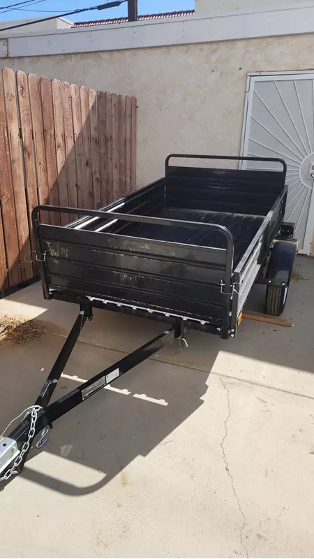 DK2 plows Mighty Multi utility trailer
