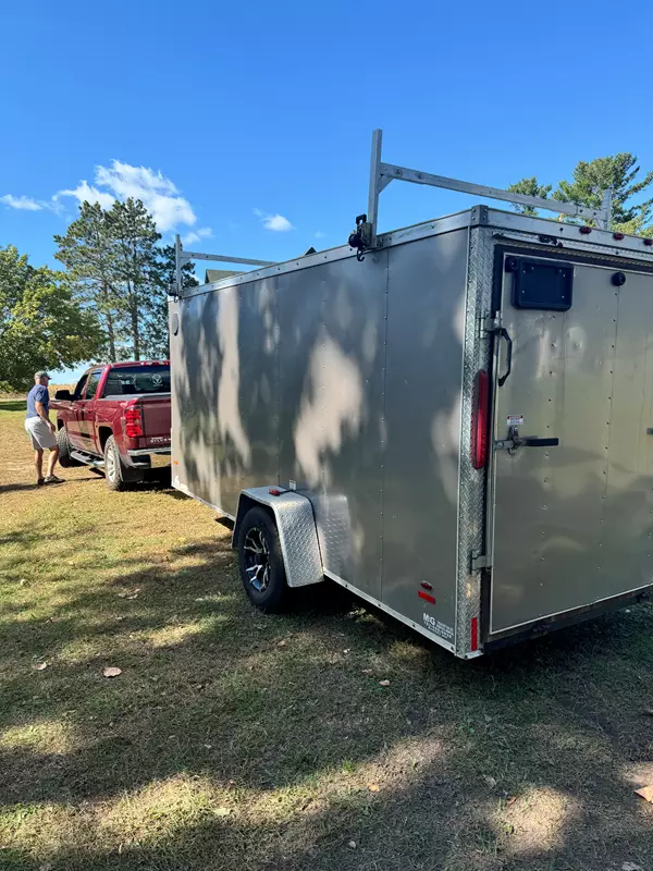 7x14 Enclosed trailer with shelving and rack