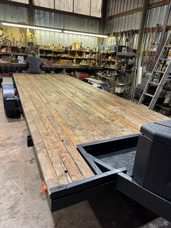 7’ by 20’ flatbed trailer with electric brakes