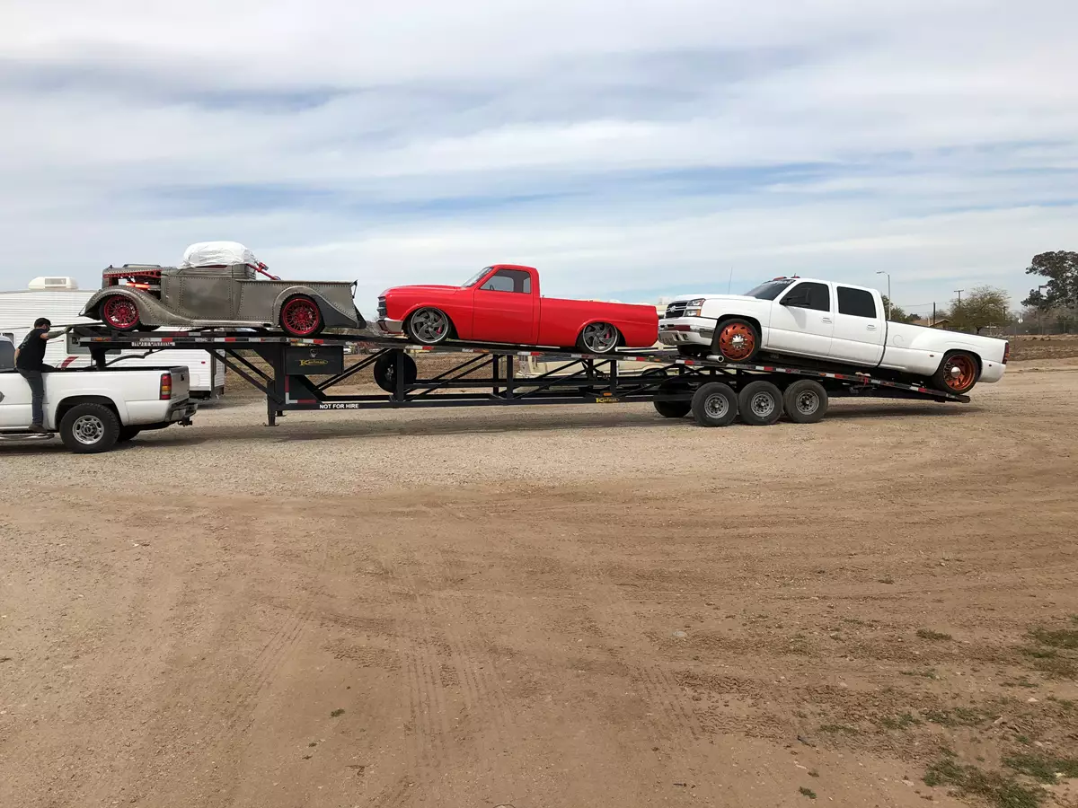 54ft Three Car Wedge Kaufman Trailer- 3 Single Wheel Axles 7k each 