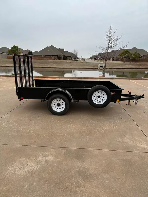 6.5 ft x 10 ft Solid-Side Utility Trailer w/ fold Ramp Gate